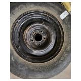 1 Tire P205/75R15 with rim