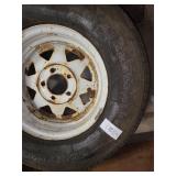 1 tire with rim - ST225/75R15