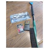 Snow scraper, lic plate frame, stud finder