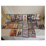 24 Unopened & 4 Opened DVD Movies