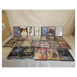 21 Unopened and 11 Opened DVD Movies
