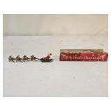 Vintage Japan Mini Metal Santa Claus on Sled