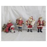 4 Clothique Santa Claus Figures