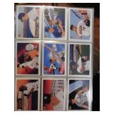 Four sleeves of baseball cards