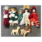 Porcelain Dolls on Stands and Toy Animals