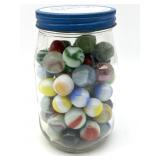 Shooter Marbles and Marbles in Lidded Glass