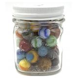Marbles in Small Glass Jar