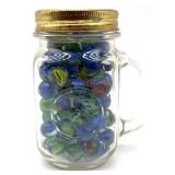 Marbles in Glass Mug Jar