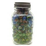 Marbles in Lidded Glass Jar