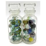 Marbles in (2) Small Glass Jars