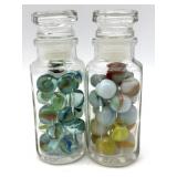 Marbles in (2) Small Glass Jars