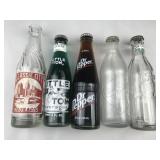 collection of vintage soda bottles