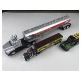 3 toy trucks