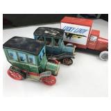 set of tin trucks