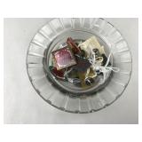 ashtray full of Olympic pins