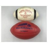 2 advertising small footballs