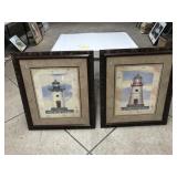 pair of lighthouse framed art