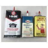 3 vintage oil cans