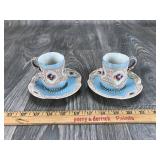 Pair of Ornate Cups and Saucers