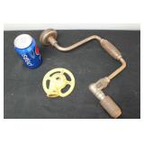 Antique drill and Cast Sprinkler Antique drill and Cast Sprinkler