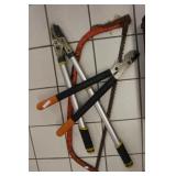 2 pruners and hand saw 2 pruners and hand saw