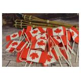 3 Torchs and 25 or more paper Canadian flags 3 Torchs and 25 or more paper Canadian flags