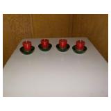 4 candle holders and candles 4 candle holders and candles