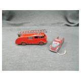 Dinky Toy firetrucks plus a smaller one.