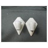 2 ceramic wall light fixtures.