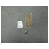 necklace with elephant charm .