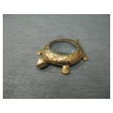 brass magnifying glass.