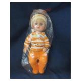 Baby in knitted outfit