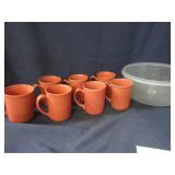 Mugs and plastic container