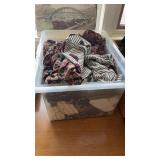 Bin of shirts