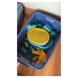 Bin of plastic dishes