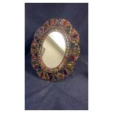 Vintage metal and bead mirror