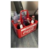 Plastic crate of Coca Cola bottles