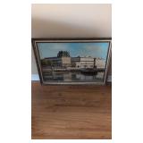 Framed oil painting of French cityscape by artist