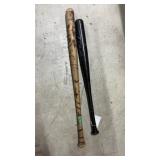 2 wooden baseball bats