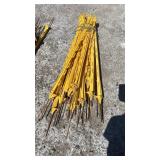 Bundle of yellow stakes
