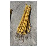 Bundle of yellow stakes