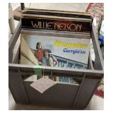 25 assorted records in crate
