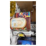 Tins and a water bottle