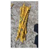 Bundle of yellow stakes