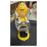 M&M yellow candy dispenser
