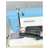 White Electric Sewing Machine in Case