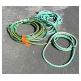 Three Green Garden Hoses with Fittings