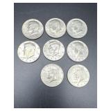 Eight Kennedy Half Dollars
