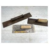 Three Masonry Tools with Wooden Handles