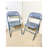 Two Gray Folding Chairs